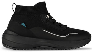 A black high-top sneaker with a knitted upper, a thick rubber sole with a treaded bottom, a small blue tag on the heel, and a reflective silver line detail.