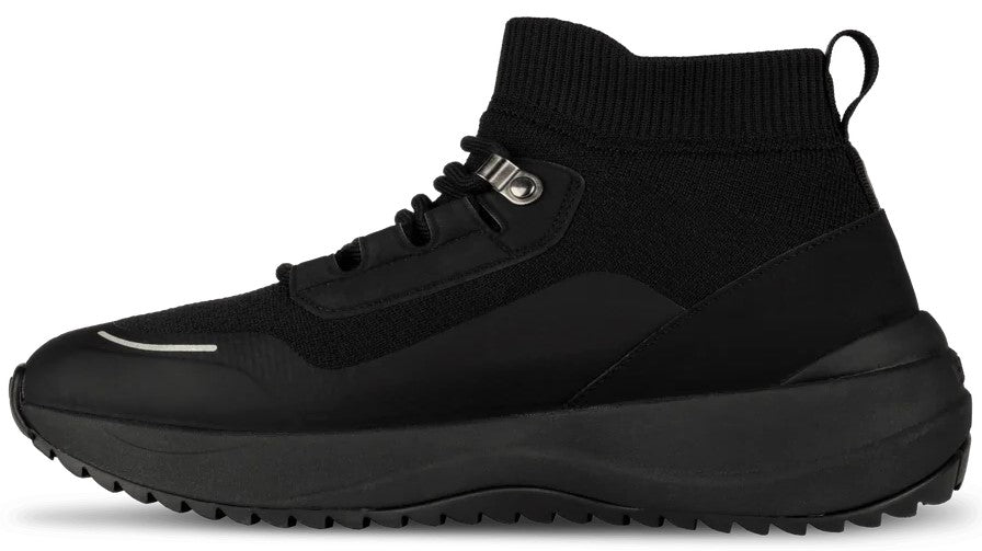 A side view of a black high-top sneaker with a knit-like upper, a thick rubber midsole, a textured rubber outsole, and a metal lace loop.