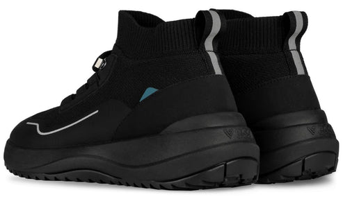 A pair of black, mid-top athletic sneakers with a knit upper, a thick black midsole, and a pull tab with a reflective silver stripe on the heel. A small teal accent is visible on the side of one shoe.