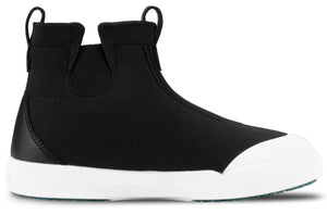 A black slip-on ankle boot with a white rubber toe cap and thick white rubber sole, featuring two pull tabs on the top collar.