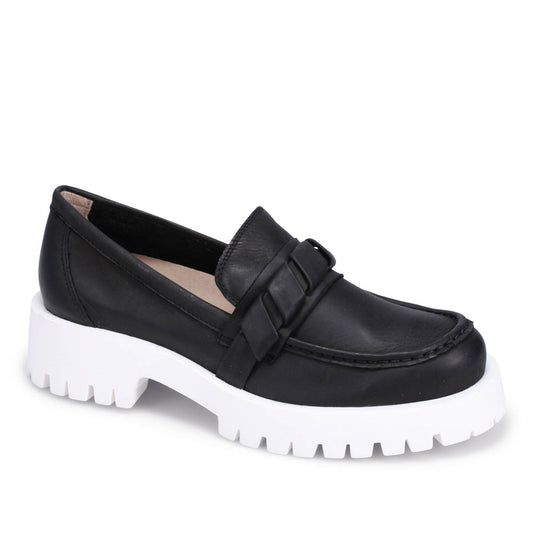 Black leather loafer with a white lug sole.