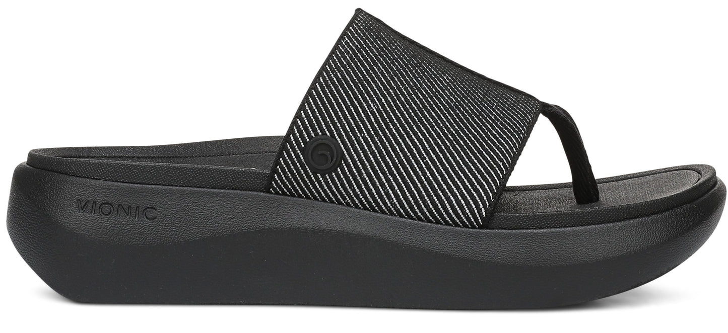 A black sandal with a vertically striped strap and toe post.