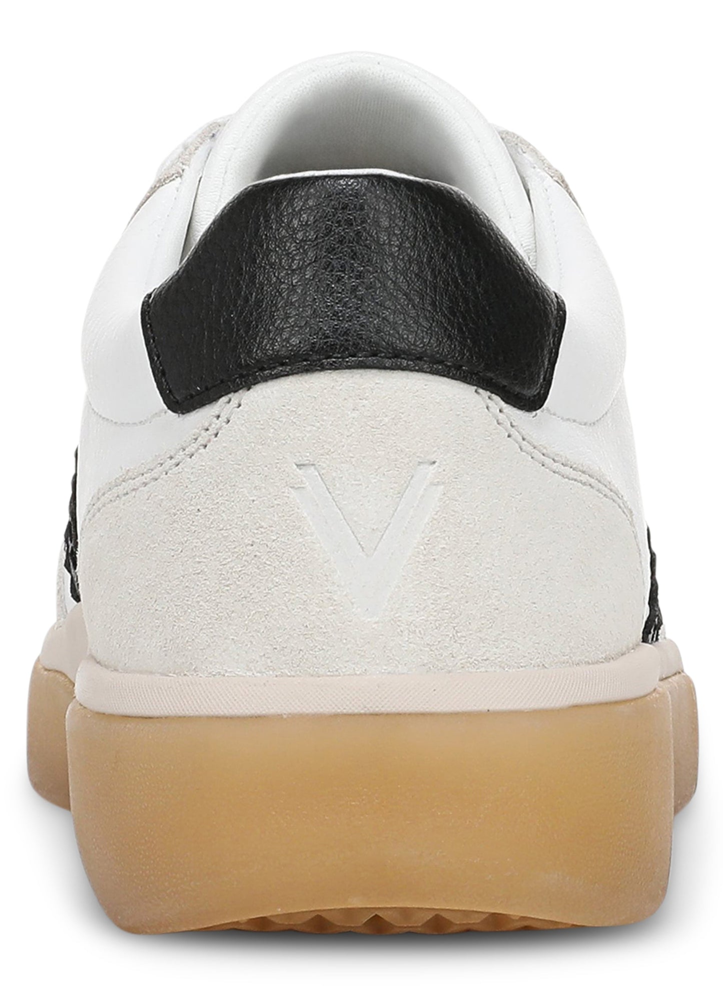 A back view of a white leather sneaker with a black heel tab, a suede heel panel embossed with a V logo, and a thick gum-colored rubber sole.