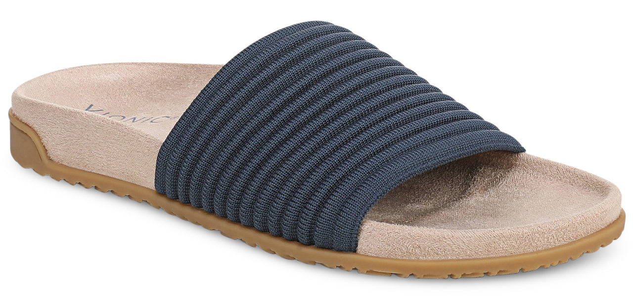 A blue ribbed sandal with a light brown sole.