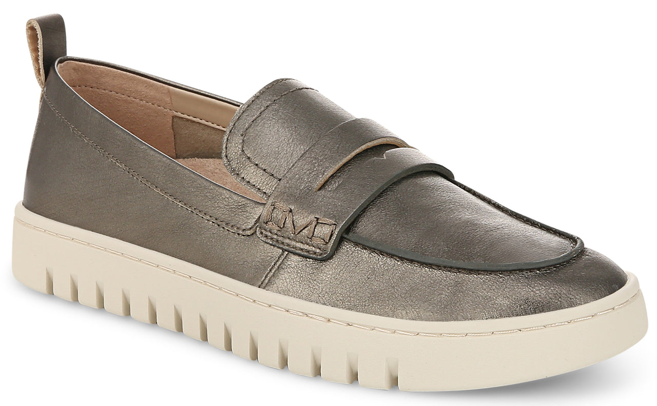 Pewter-colored loafer with a white sole.