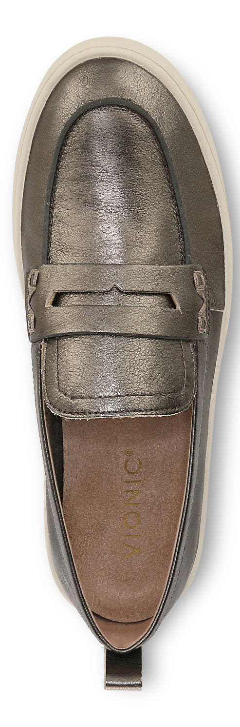 A metallic colored loafer with a white sole.