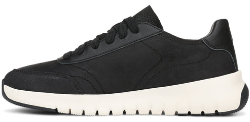 A minimalist, side-view of a black low-top sneaker with a black textured upper, black laces, and a thick, white, grooved rubber sole.