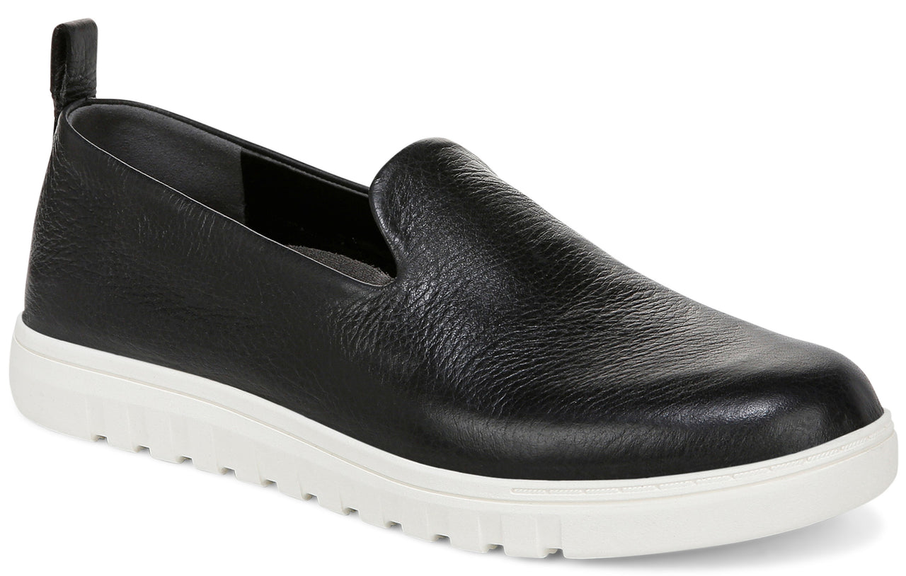 Black leather slip-on shoe with a white sole and a small heel pull tab.