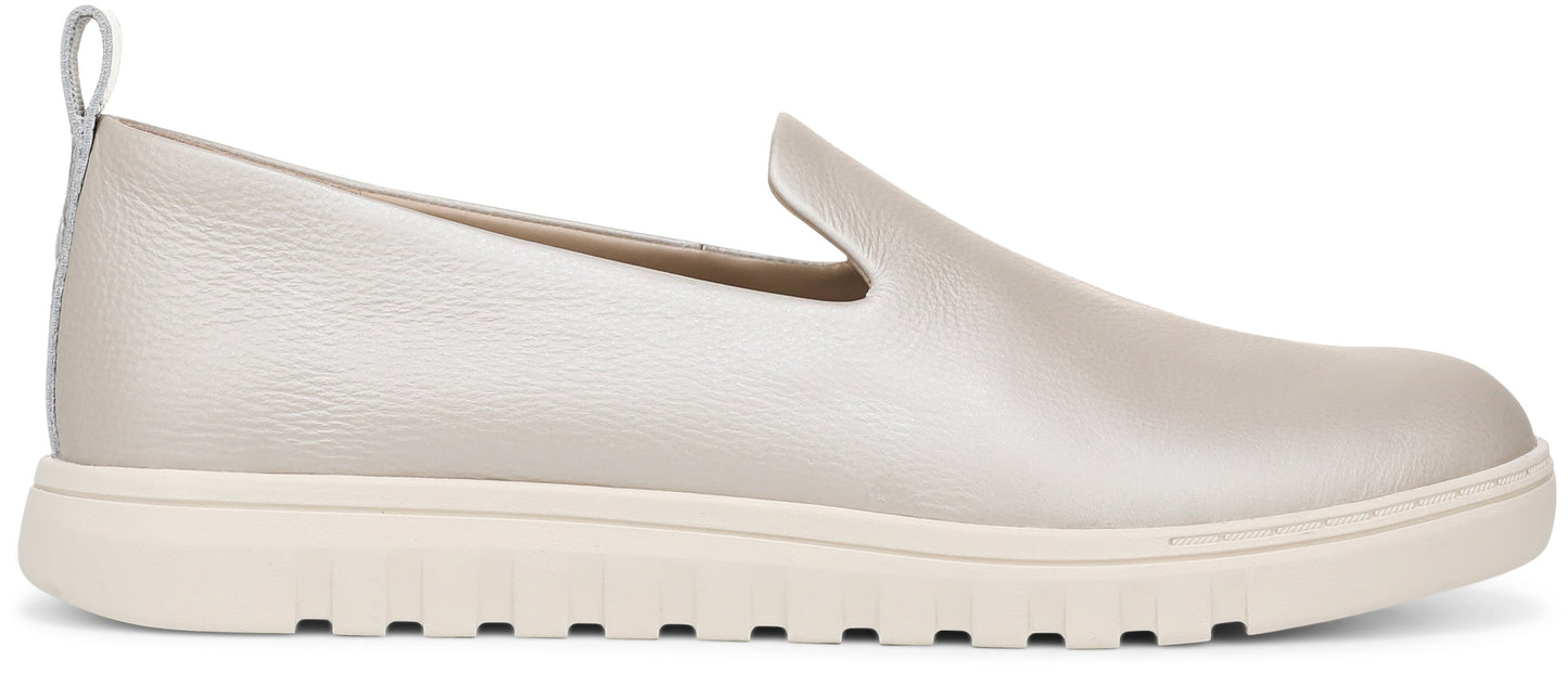 Slip-on shoe with a rounded toe and a thick, flat sole.