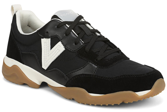 A black sneaker with white accents on the side and tongue, featuring a gum rubber outsole.