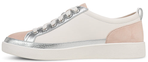 A white sneaker with a silver trim and pink heel.