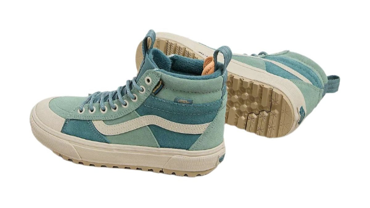 Teal, high-top sneaker with a white stripe and a lug sole.