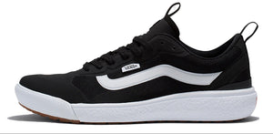 A black sneaker with a white stripe on a white sole.