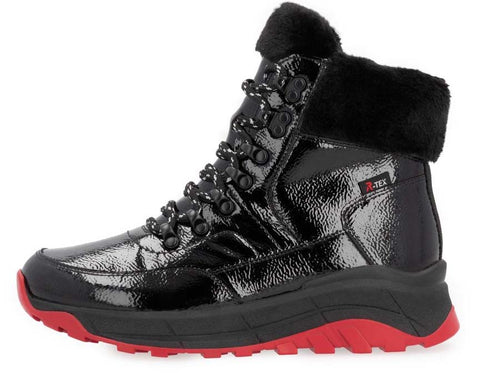 Black patent leather high-top boot with faux fur collar, lace-up closure and red sole.