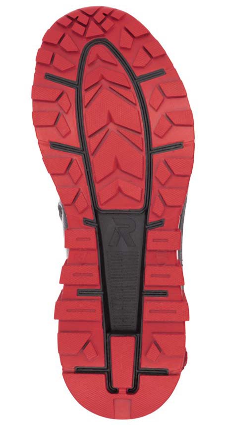 Red and black shoe sole with geometric patterns.