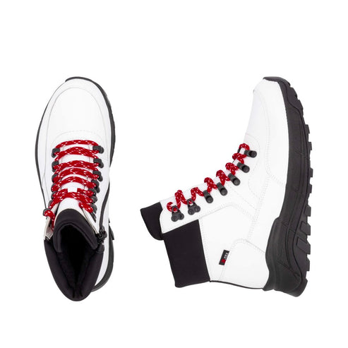 Two white high-top boots with red laces and black soles and trim.