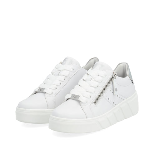 A pair of white sneakers with laces and side zippers, set on chunky platform soles.