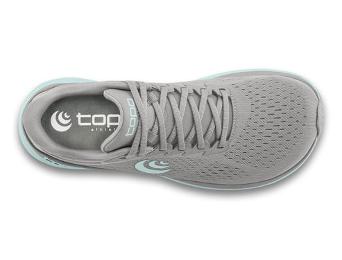 Overhead shot of a gray running shoe with light blue trim, featuring laces and the word "topo" on its tongue.