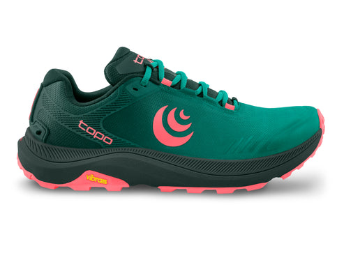 Green and pink athletic shoe with a brand logo in pink.