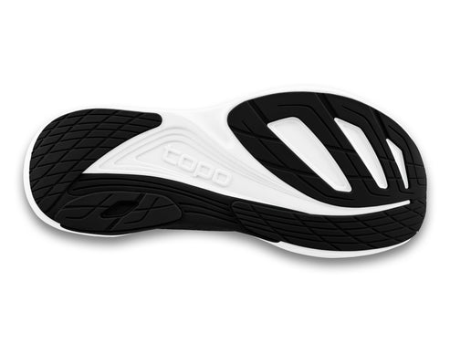 Bottom of shoe with black tread and a white midsole showing "TOPO" branding.
