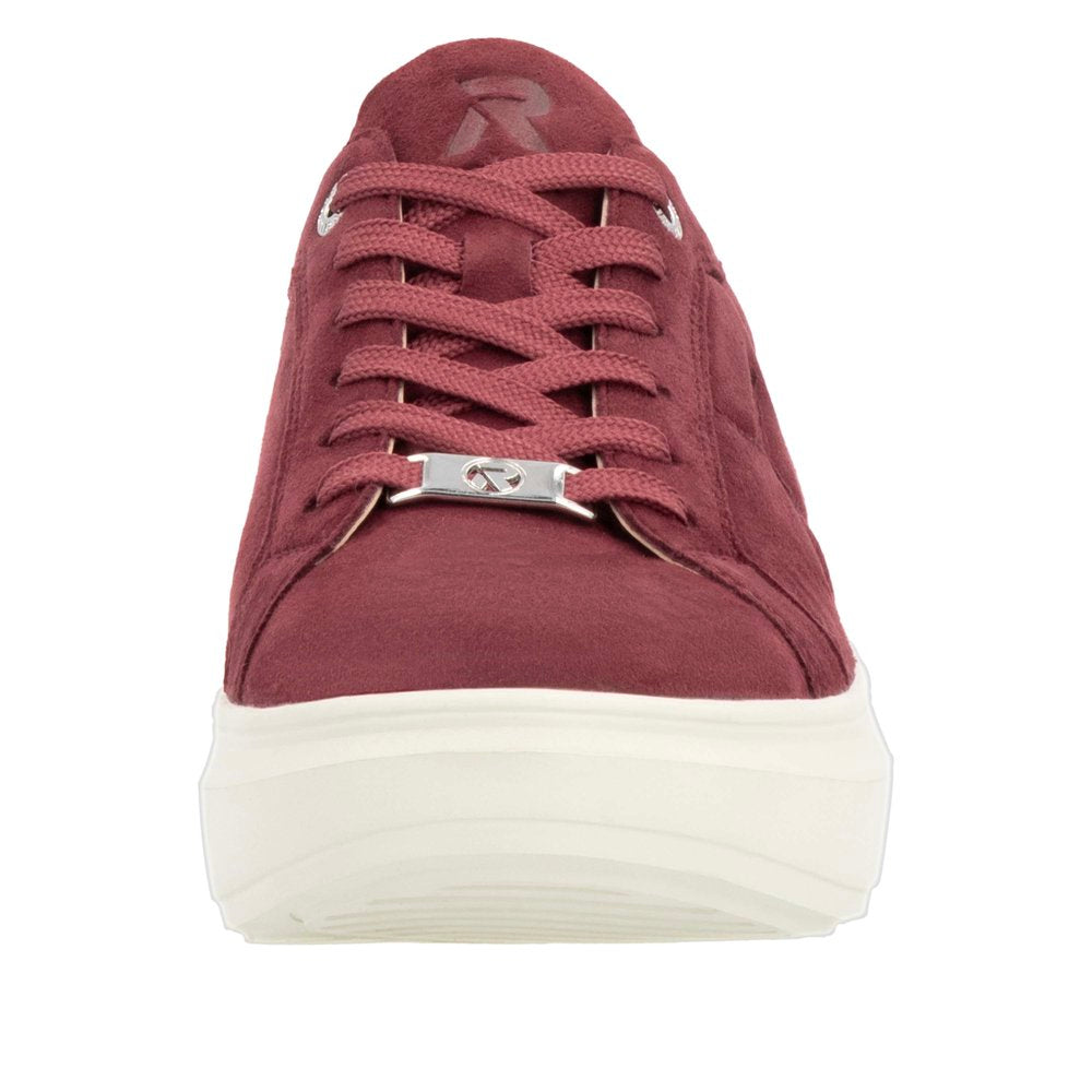 Burgundy low-top sneaker with laces and a thick white sole.