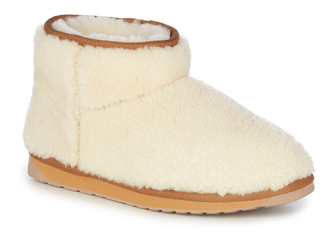 Ivory slipper boot with fur lining and rubber sole