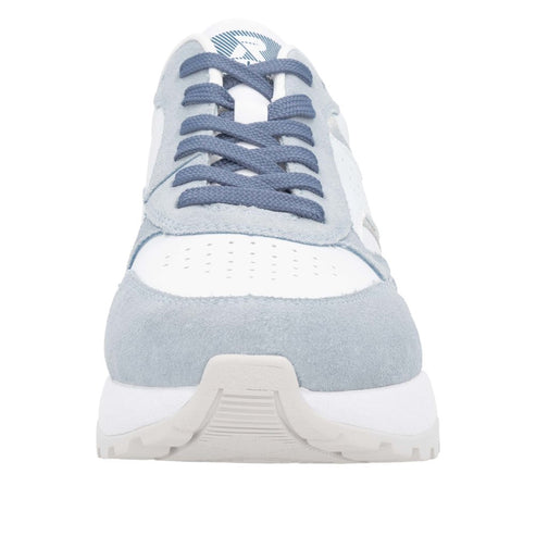 Eye-level shot of a blue-and-white sneaker with blue laces.