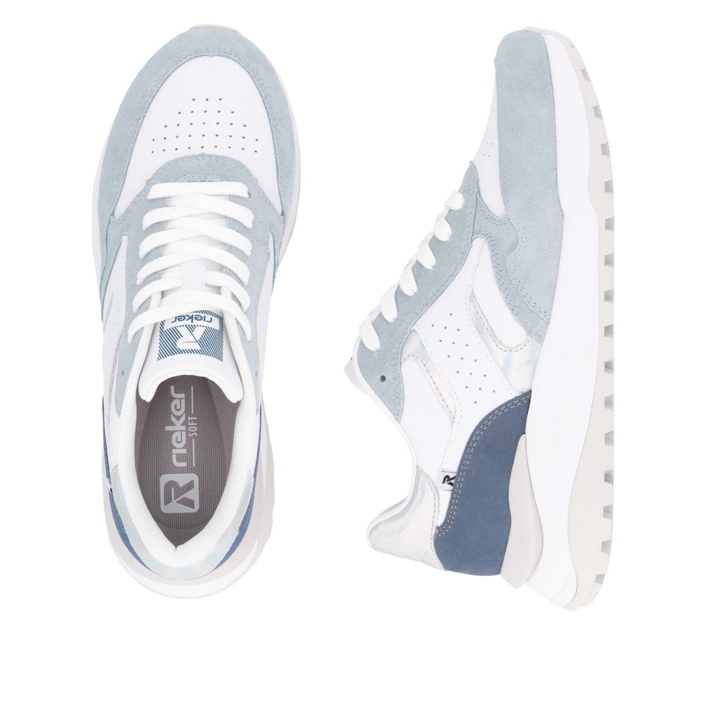 Pair of white sneakers with light blue accents; top-down view of left shoe shows white laces, light blue trim, and 'Rieker SOFT+' printed on the insole; side view of right shoe.