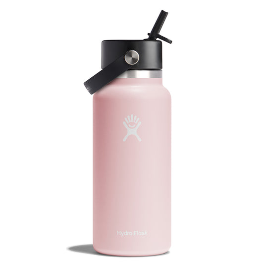 Pink water bottle with straw lid and a black handle.