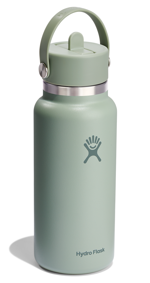 Green insulated water bottle with carry handle and logo that reads 'Hydro Flask'.