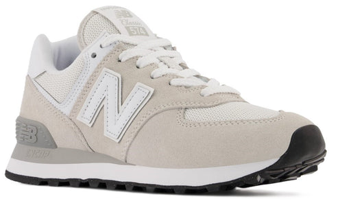 Light gray sneaker with white laces and logo on side.