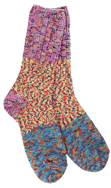 Pair of ribbed crew socks with a tie dye pattern in pink, orange, and blue.