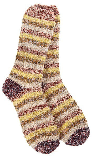 Pair of striped fuzzy socks with tan, yellow, and red stripes.