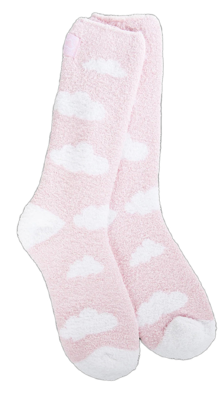 Two fuzzy pink socks with white clouds.