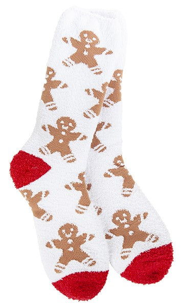 Pair of white fuzzy socks with gingerbread men pattern and red toe and heel.