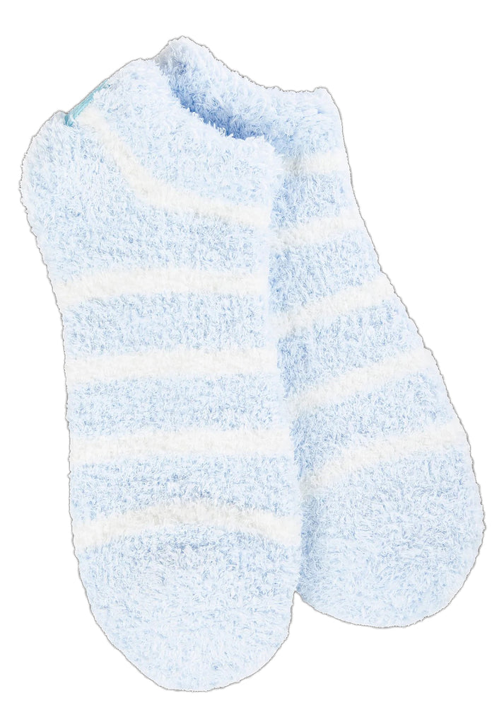Light blue fuzzy socks with white stripes.