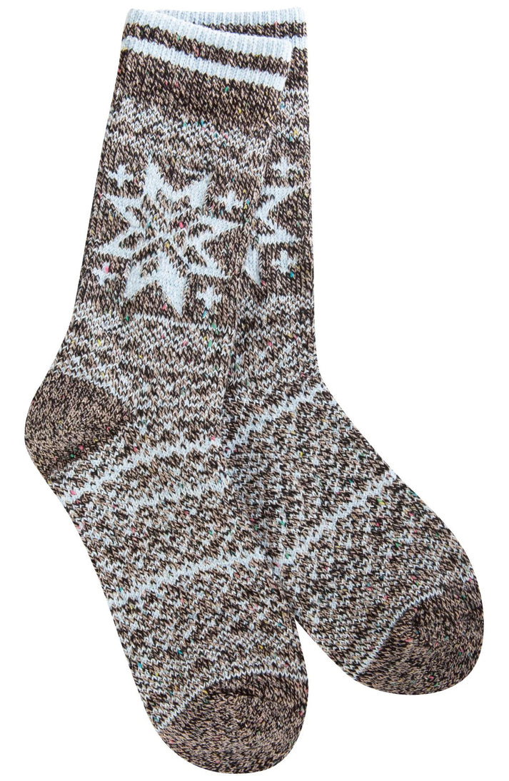Pair of brown and white socks with snowflake pattern.