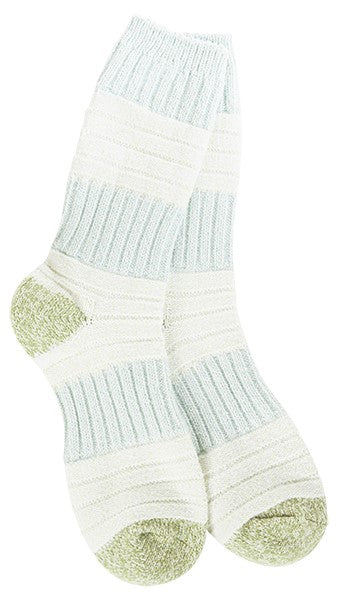 A pair of fuzzy, striped socks with light green heels and toes.