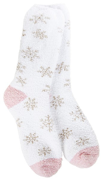 Pair of white fuzzy socks with pink toes and heels, patterned with light gray snowflakes.