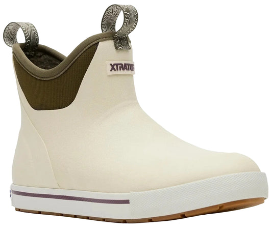 A slip-on ankle boot with an off-white rubber lower section, an olive green stretchy collar, pull loops at the back, a white midsole with a thin dark stripe, and a gum-colored rubber outsole, with XTRATUF visible on the side.