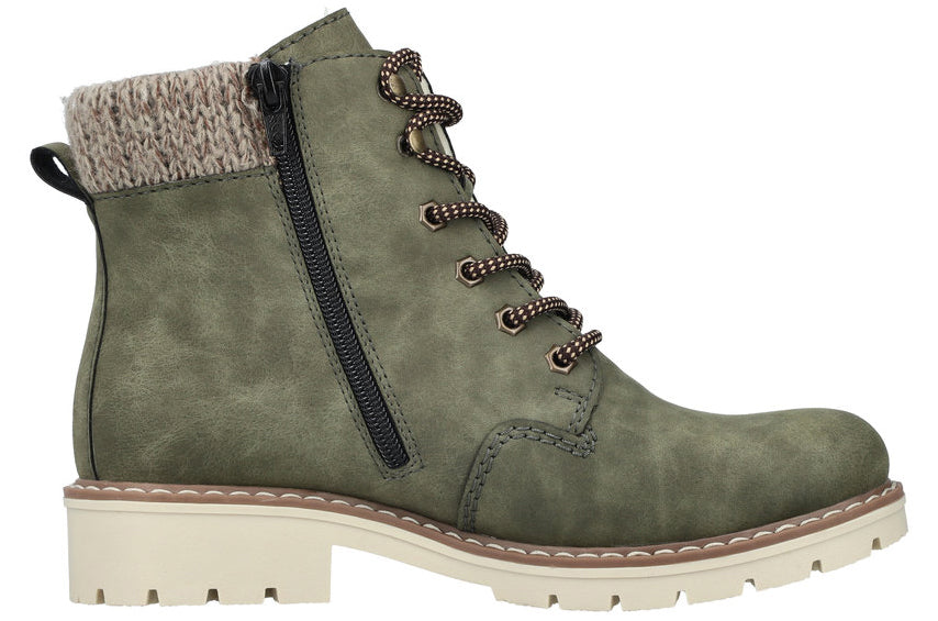 Olive green ankle boot with knitted cuff, lug sole, and decorative side zipper.