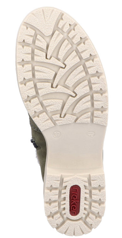 Off-white lug sole with tread, featuring the text "Rieker".