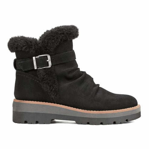 Black ankle boot with faux fur trim and buckle strap.