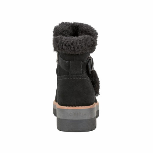 Black ankle boot with fur trim and buckle.