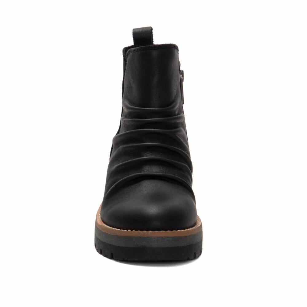 Black leather ankle boot with a side zipper and a chunky platform sole.