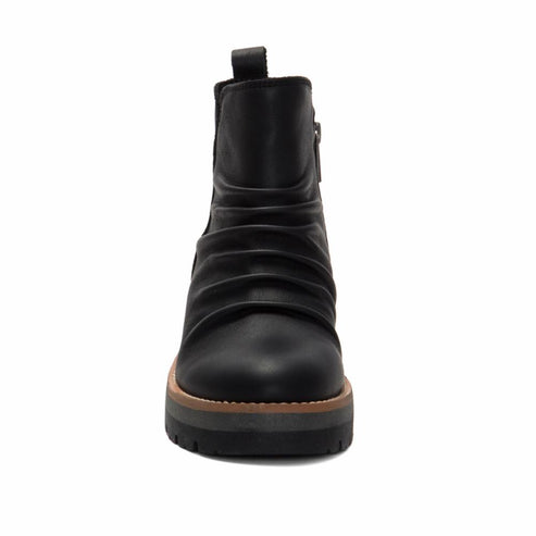 Black leather ankle boot with a side zipper and a chunky platform sole.
