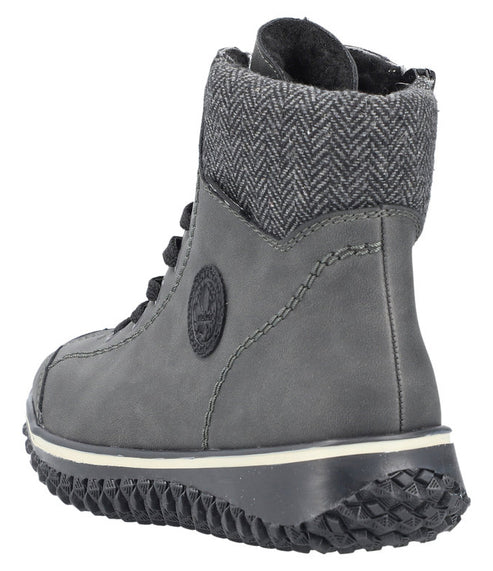 Gray lace-up ankle boot with herringbone patterned collar and treaded sole.