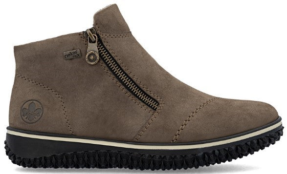 Taupe ankle boot with a side zipper and black sole.