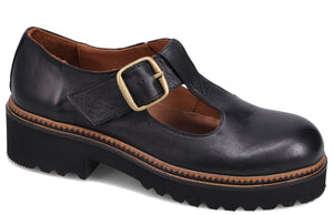 Black leather Mary Jane style shoe with a chunky lug sole and a gold buckle.