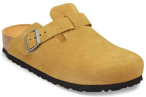 A yellow suede clog with a cork footbed, a black rubber sole, and an adjustable metal buckle strap over the instep.